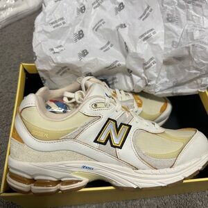 New Balance Cream and Yellow Athletic Shoes
